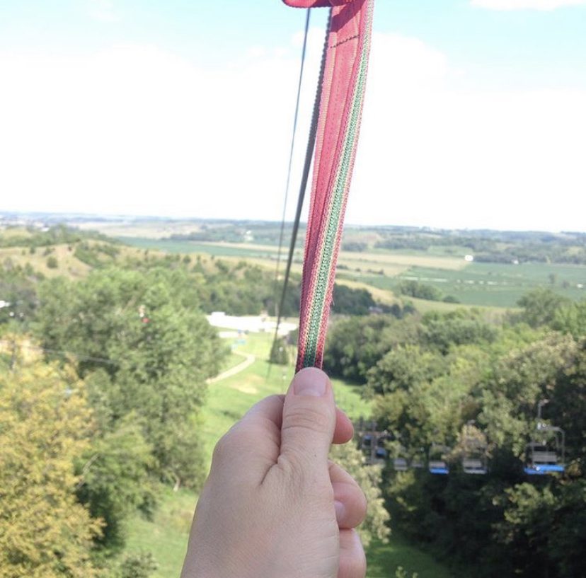 At the top of a zip line course at Mt. Crescent