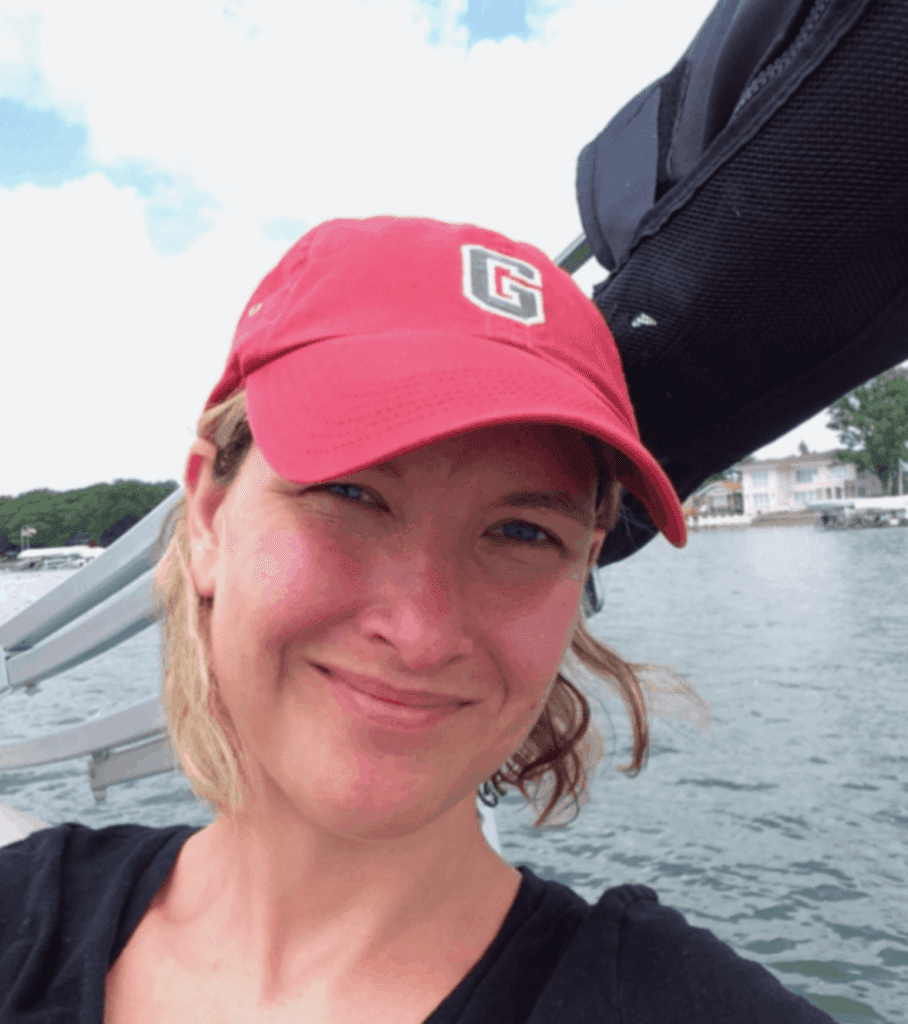 A selfie of Kim on a boat on Clear Lake