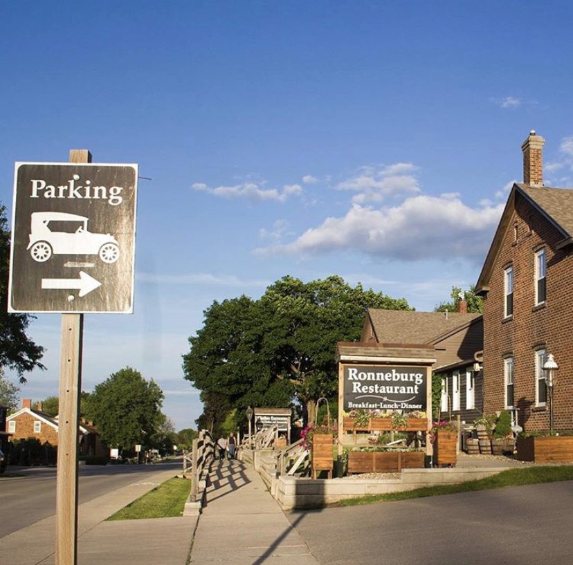 A sign for buggy parking in front of Ronneburg Restaurant in Amana.