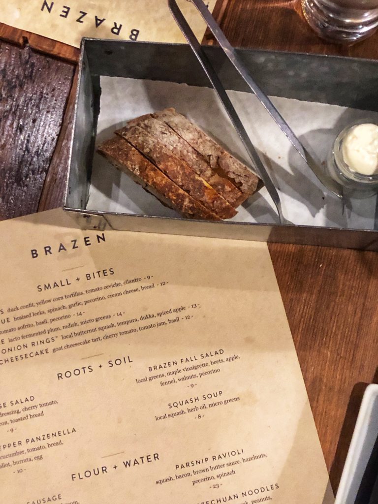 Bread and a menu at Brazen in Dubuque, Iowa