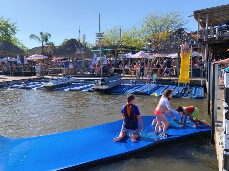 Kids playing in the lake at the Barefoot Bar in Okoboji, Iowa 