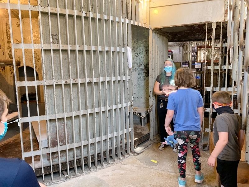 Kids on a tour of Squirrel Cage Jail in Council Bluffs