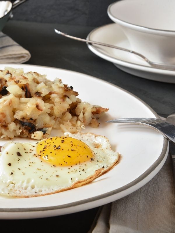 Eggs over easy and hash browns