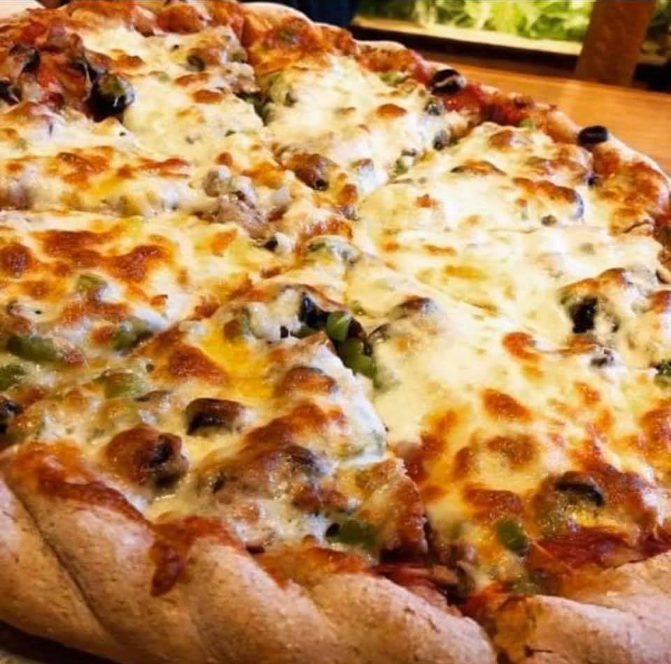 Up-close photo of pizza at Great Plains Sauce & Dough Co. in Ames, Iowa