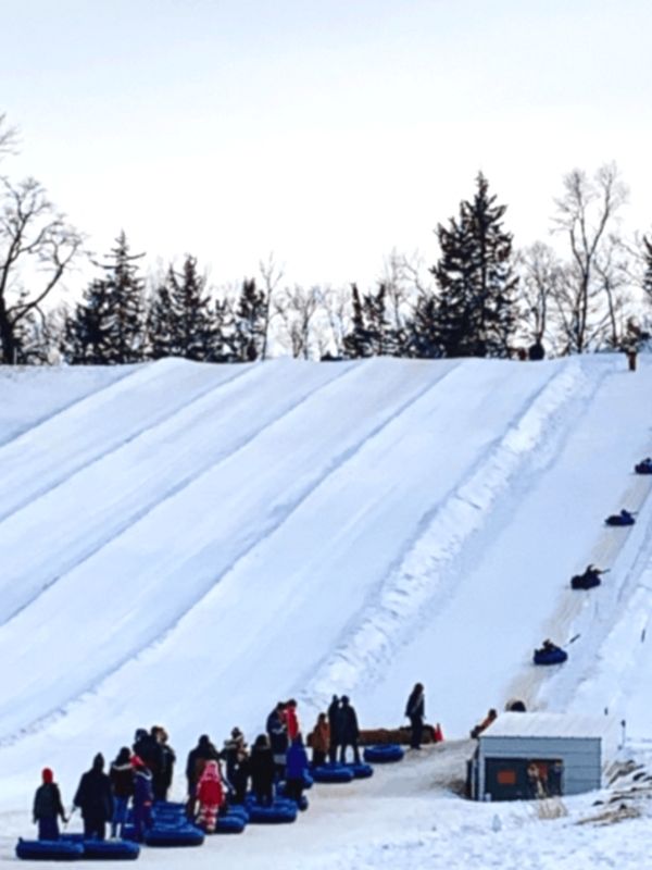 Snow tubers wait in line at Seven Oaks Recreation 