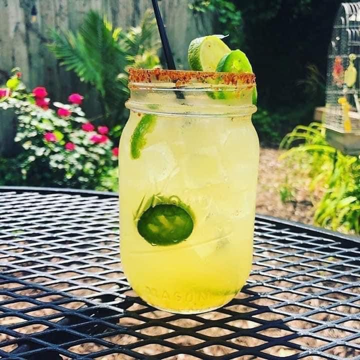 A drink in a mason jar at Ceviche Bar patio in Des Moines