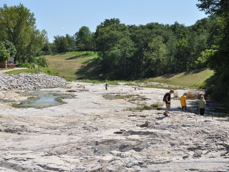 People explore the Devonian Fossil Gorge