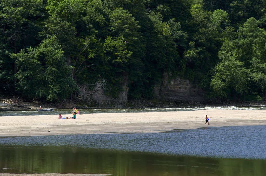 People play on a sandbar at Palisades-Kepler State Park