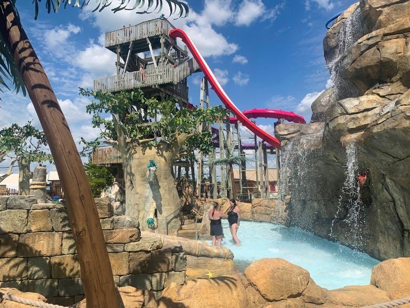 Lost Island Waterpark lagoon and a slide in the background