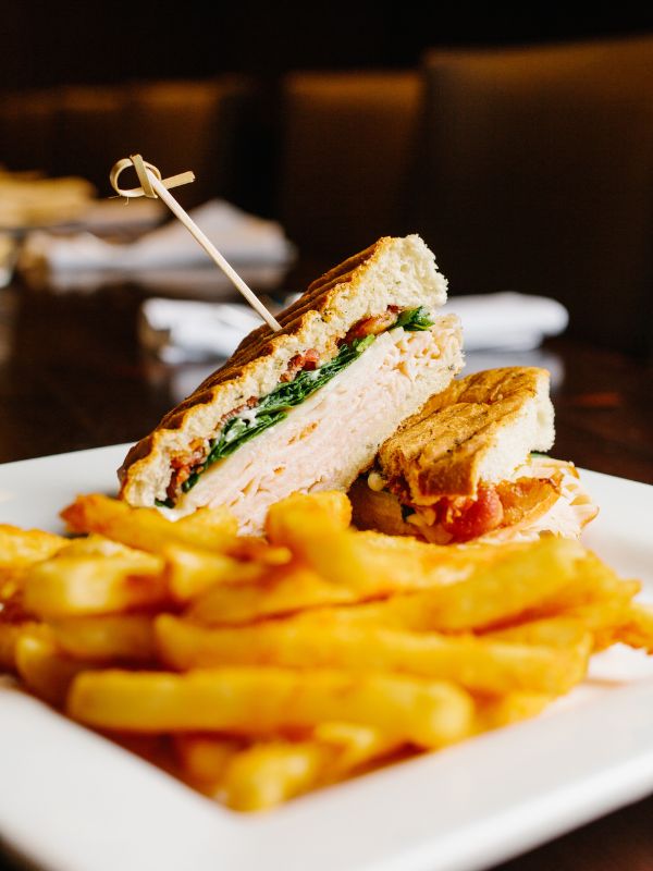 A club sandwich and fries at Caroline's Restaurant