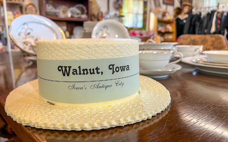 Vintage hat that reads: Walnut, Iowa - Iowa's Antique City