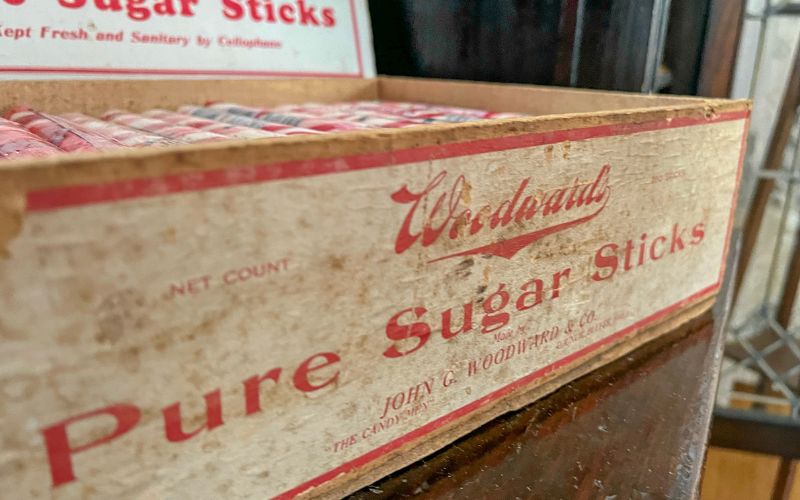 A box of sugar sticks made by Woodward's & Company