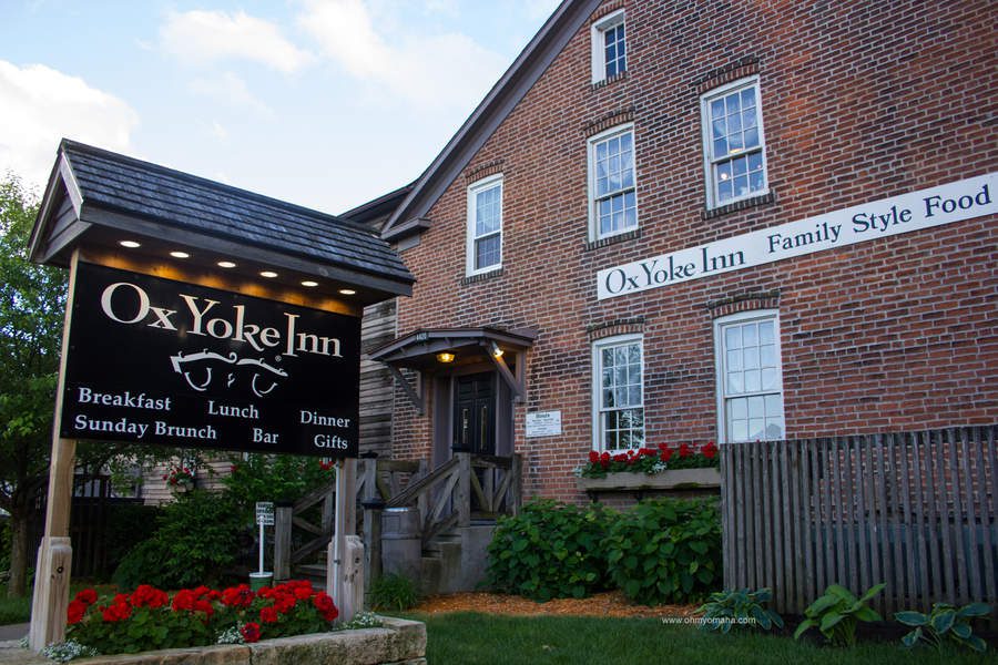 Exterior of Ox Yoke Inn and sign in Amana, Iowa 