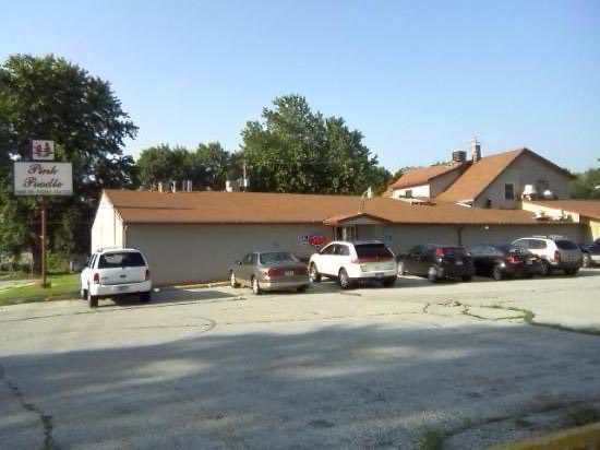 The exterior of Pink Poodle Steakhouse in Crescent, Iowa