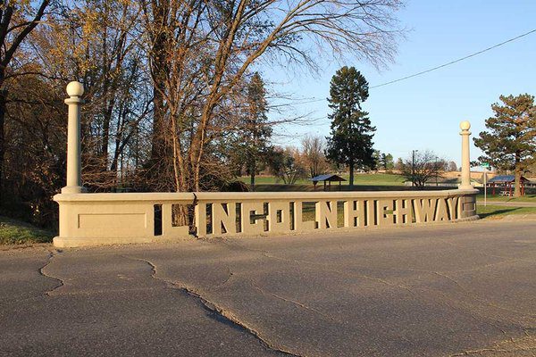 The words "Lincoln Highway" carved into the Historic Lincoln Highway Bridge in Tama, Iowa