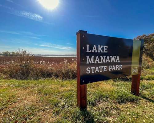 A sign for Lake Manawa State Park in Council Bluffs, Iowa