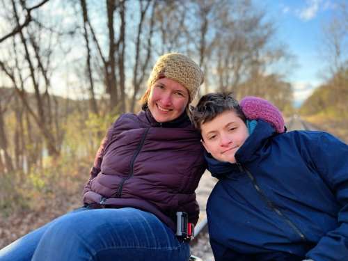 Kim and her son on the rail in Boone, Iowa