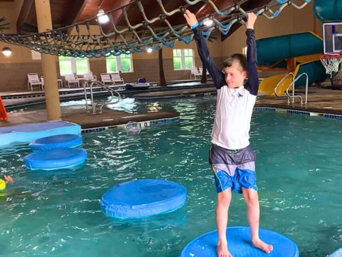 A boy plays at Buccaneer Bay located at the Honey Creek Resort in Moravia, Iowa