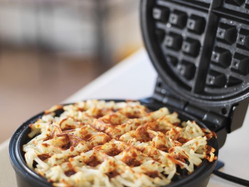 Up-close photo of a waffle in a waffle maker