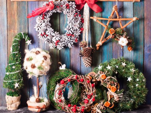 Rustic, farmhouse style Christmas decorations like wreaths and mini trees