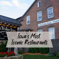 The red brick exterior of the Ox Yoke Inn located in Amana, Iowa, with the text "Iowa's Most Iconic Restaurants" on top of the picture