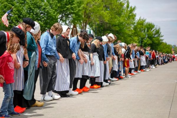 A long line of people prepared to dance during the Tulip Festival 